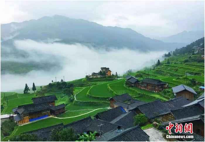 被云海梯田托起的白岩村 “分享村庄”带火民宿旅游 梯田村走上脱贫振兴路